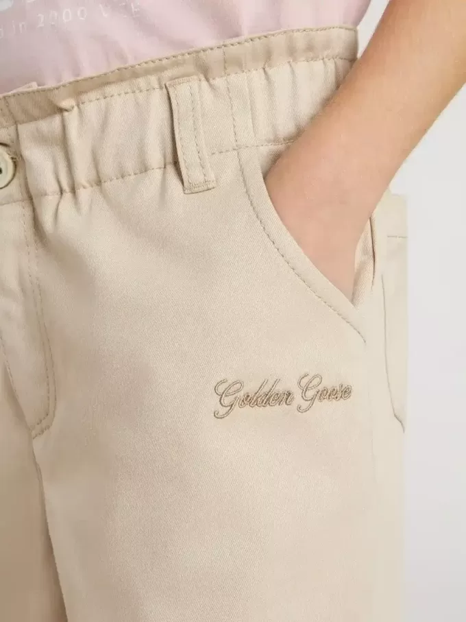 Pantalones de algodón beige con bordado para niña Pantalones de algodón beige con bordado para niña