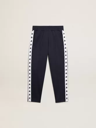 Pantalones de chándal azul oscuro con franja blanca y estrellas en contraste