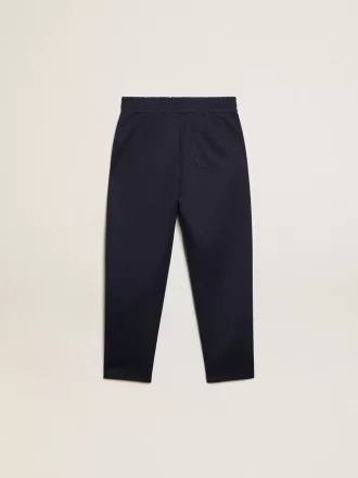 Pantalones de chándal azul oscuro con franja blanca y estrellas en contraste