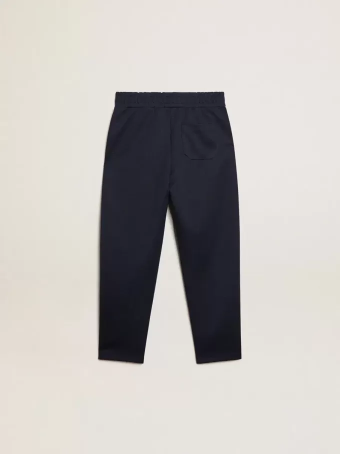 Pantalones de chándal azul oscuro con franja blanca y estrellas en contraste Pantalones de chándal azul oscuro con franja blanca y estrellas en contraste