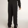 Pantalones de chándal azul oscuro con franja blanca y estrellas en contraste Pantalones de chándal azul oscuro con franja blanca y estrellas en contraste