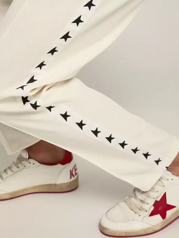 Pantalones de chándal blancos para hombre con estrellas negras en los laterales Pantalones de chándal blancos para hombre con estrellas negras en los laterales