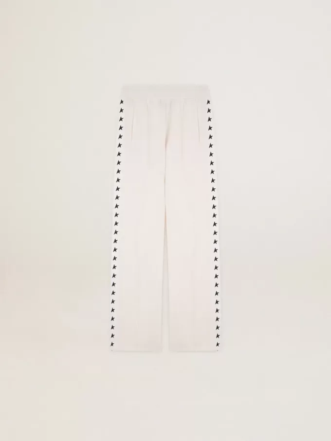 Pantalones de chándal blancos para mujer con estrellas en los laterales Pantalones de chándal blancos para mujer con estrellas en los laterales