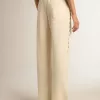 Pantalones de chándal blancos para mujer con estrellas en los laterales Pantalones de chándal blancos para mujer con estrellas en los laterales