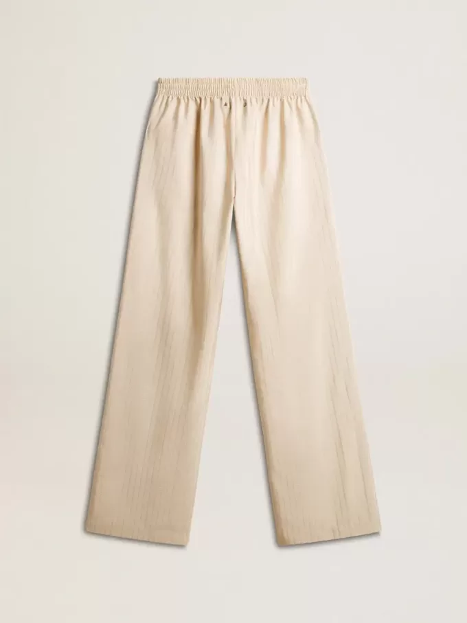 Pantalones de chándal de seda y viscosa beige claro para mujer. Pantalones de chándal de seda y viscosa beige claro para mujer.