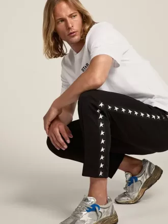Pantalones de chándal negros para hombre con estrellas blancas en los laterales Pantalones de chándal negros para hombre con estrellas blancas en los laterales