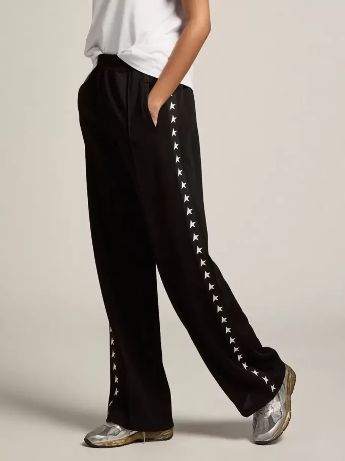 Pantalones de chándal negros para mujer con estrellas blancas en los laterales Pantalones de chándal negros para mujer con estrellas blancas en los laterales
