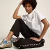 Pantalones de chándal negros para mujer con estrellas blancas en los laterales Pantalones de chándal negros para mujer con estrellas blancas en los laterales