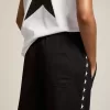 Pantalones de chándal negros para mujer con estrellas blancas en los laterales Pantalones de chándal negros para mujer con estrellas blancas en los laterales