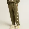 Pantalones de chándal para niño en verde militar con estrellas blancas Pantalones de chándal para niño en verde militar con estrellas blancas