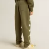 Pantalones de chándal para niño en verde militar con estrellas blancas Pantalones de chándal para niño en verde militar con estrellas blancas