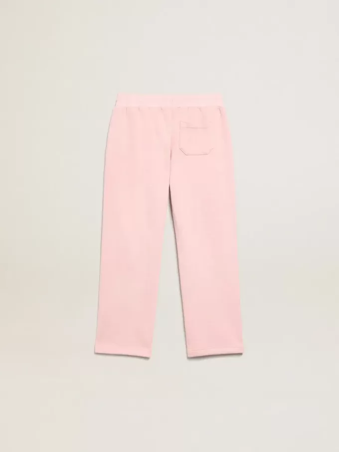 Pantalones de chándal rosas con estrella brillante en la parte delantera. Pantalones de chándal rosas con estrella brillante en la parte delantera.