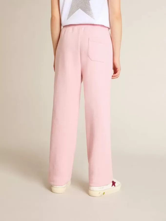 Pantalones de chándal rosas con estrella brillante en la parte delantera. Pantalones de chándal rosas con estrella brillante en la parte delantera.