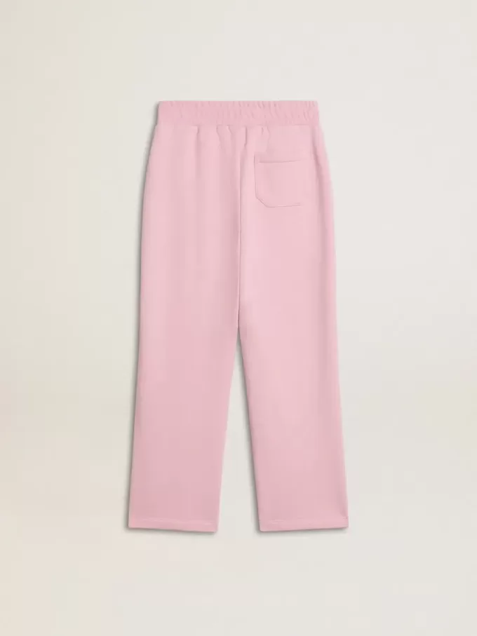 Pantalones de chándal rosas con estrella brillante en la parte delantera. Pantalones de chándal rosas con estrella brillante en la parte delantera.