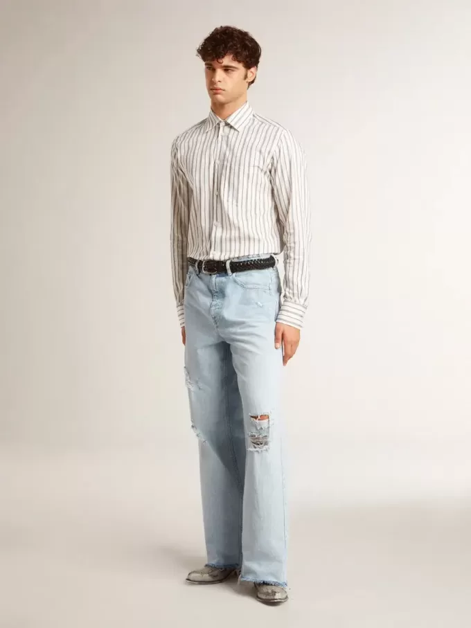 Pantalones de hombre en denim con efecto desgastado