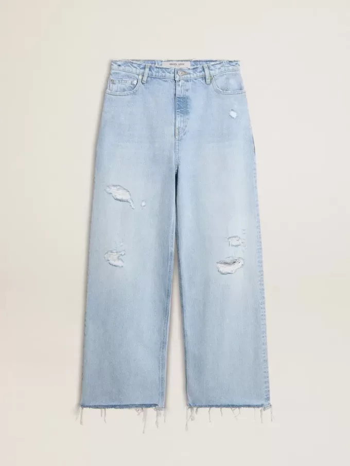 Pantalones de mujer en denim con efecto desgastado Pantalones de mujer en denim con efecto desgastado