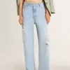 Pantalones de mujer en denim con efecto desgastado Pantalones de mujer en denim con efecto desgastado