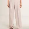 Pantalones de mujer en tejido de lana rosa entallado Pantalones de mujer en tejido de lana rosa entallado