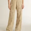 Pantalones de pijama para mujer en jacquard beige con estampado floral Pantalones de pijama para mujer en jacquard beige con estampado floral