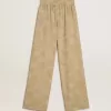 Pantalones de pijama para mujer en jacquard beige con estampado floral Pantalones de pijama para mujer en jacquard beige con estampado floral