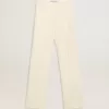 Pantalones holgados de mujer en tejido sastre blanco desgastado Pantalones holgados de mujer en tejido sastre blanco desgastado