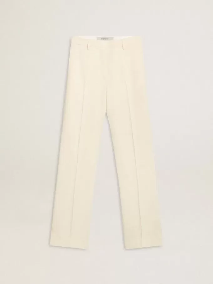 Pantalones holgados de mujer en tejido sastre blanco desgastado Pantalones holgados de mujer en tejido sastre blanco desgastado