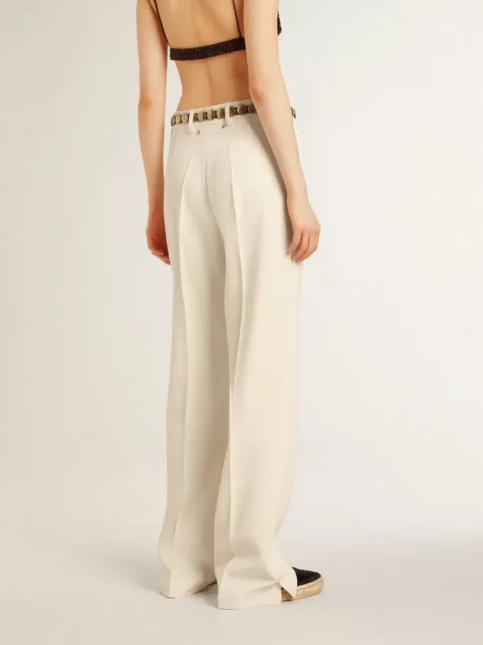 Pantalones holgados de mujer en tejido sastre blanco desgastado Pantalones holgados de mujer en tejido sastre blanco desgastado