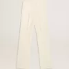Pantalones holgados de mujer en tejido sastre blanco desgastado Pantalones holgados de mujer en tejido sastre blanco desgastado