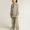 Pantalones joggers cargo de algodón gris jaspeado con bordados. Pantalones joggers cargo de algodón gris jaspeado con bordados.