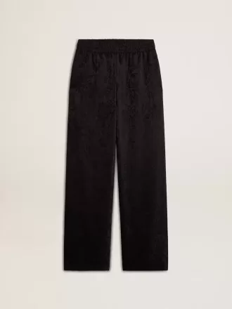 Pantalones joggers negros para mujer con estampado toile de jouy tono sobre tono