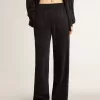 Pantalones joggers negros para mujer con estampado toile de jouy tono sobre tono Pantalones joggers negros para mujer con estampado toile de jouy tono sobre tono