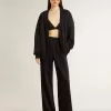 Pantalones joggers negros para mujer con estampado toile de jouy tono sobre tono Pantalones joggers negros para mujer con estampado toile de jouy tono sobre tono
