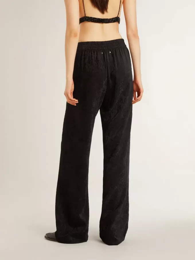 Pantalones joggers negros para mujer con estampado toile de jouy tono sobre tono Pantalones joggers negros para mujer con estampado toile de jouy tono sobre tono