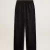 Pantalones joggers negros para mujer con estampado toile de jouy tono sobre tono Pantalones joggers negros para mujer con estampado toile de jouy tono sobre tono