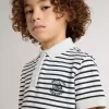 Polo blanco de algodón para niño con rayas azul marino y bordado