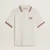 Polo de hombre en punto perforado blanco con detalles de rayas burdeos