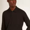 Polo de manga larga para hombre en lana merino negra Polo de manga larga para hombre en lana merino negra