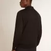 Polo de manga larga para hombre en lana merino negra Polo de manga larga para hombre en lana merino negra