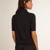 Polo de mujer en lana merino azul marino Polo de mujer en lana merino azul marino