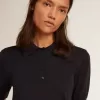 Polo de mujer en lana merino azul marino Polo de mujer en lana merino azul marino
