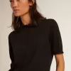 Polo de mujer en lana merino negra Polo de mujer en lana merino negra