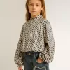 Polo para niña con estampado geométrico Polo para niña con estampado geométrico