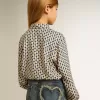 Polo para niña con estampado geométrico Polo para niña con estampado geométrico