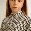 Polo para niña con estampado geométrico Polo para niña con estampado geométrico
