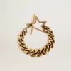 Pulsera con cadena decreciente en oro antiguo y cierre en forma de estrella Pulsera con cadena decreciente en oro antiguo y cierre en forma de estrella