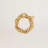 Pulsera de cadena tejida en color oro antiguo con cierre en forma de estrella Pulsera de cadena tejida en color oro antiguo con cierre en forma de estrella