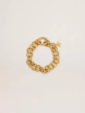 Pulsera de cadena tejida en color oro antiguo con cierre en forma de estrella Pulsera de cadena tejida en color oro antiguo con cierre en forma de estrella