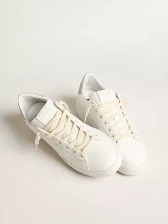 Purestar con estrella blanca y lengüeta de cuero gris en el talón