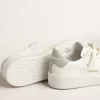 Purestar con estrella blanca y lengüeta de cuero gris en el talón