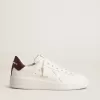 Purestar con estrella de cuero blanco y lengüeta del talón de cuero ciruela